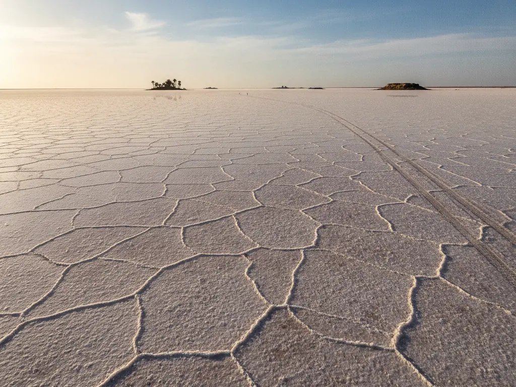The vast salt flats of Chott el Djerid shimmer under the desert sun.