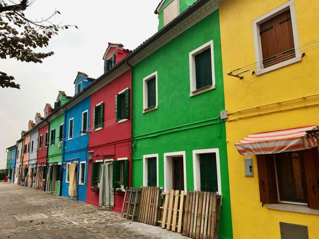 Colorful row of buildings in Burano