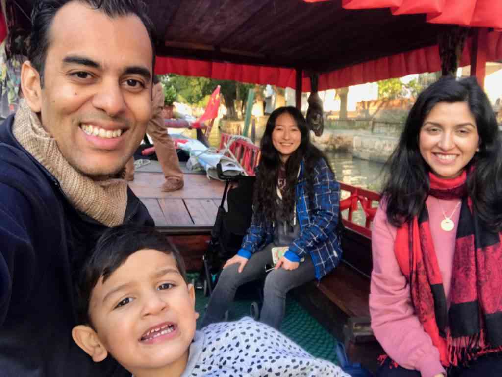 One of our favorite pictures from the boat tour in Jinze Water Town with the family and our tour guide