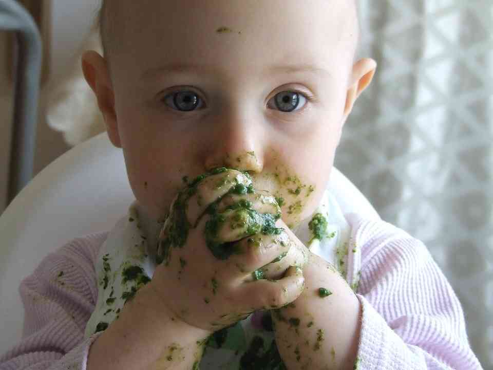 baby eating messy face
